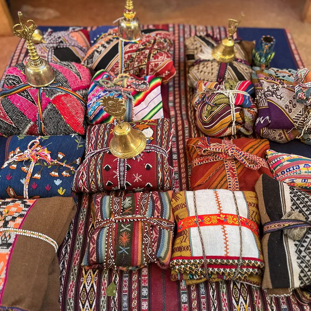 A paqo's mesa bundle with khuyas — the tradition behind coca leaf reading meaning